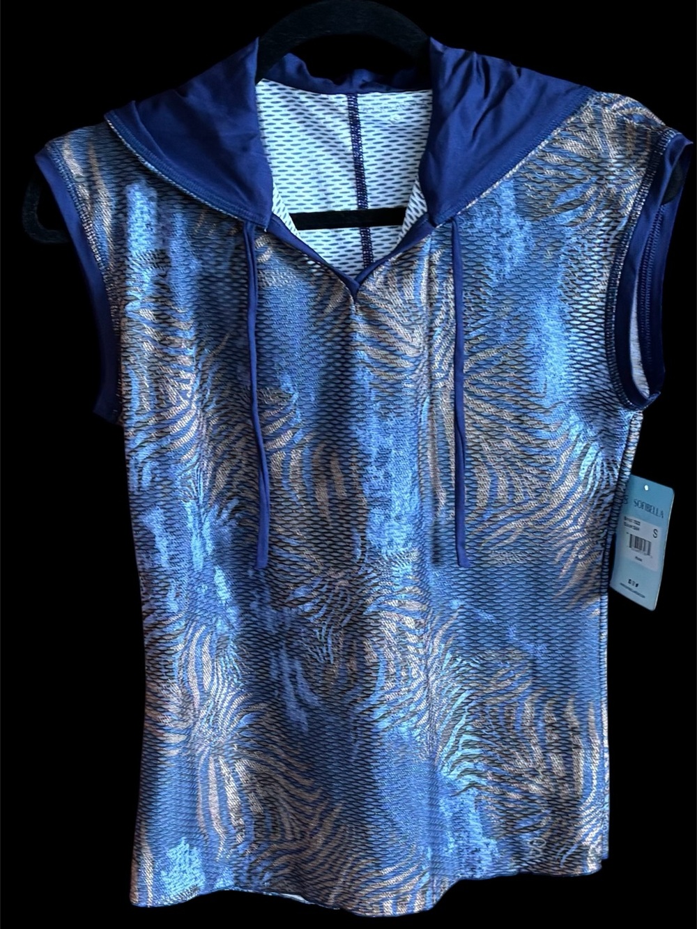 Sofibella hooded sleeveless top for tennis, pickleball, and golf.